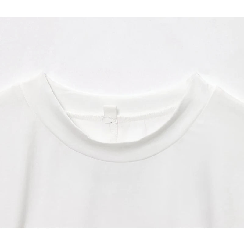 Lucía | Top corto oversize con mangas murciélago