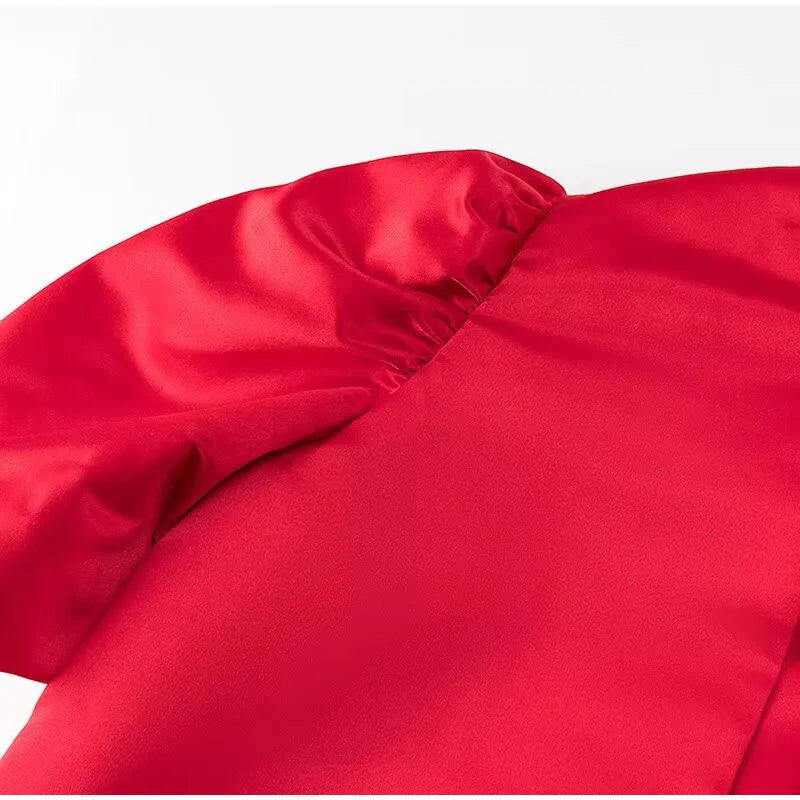 Carmen | Blusa satinada con mangas abullonadas