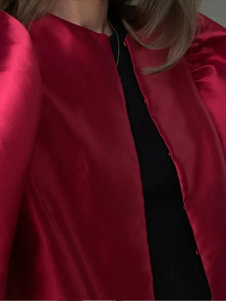 Carmen | Blusa satinada con mangas abullonadas